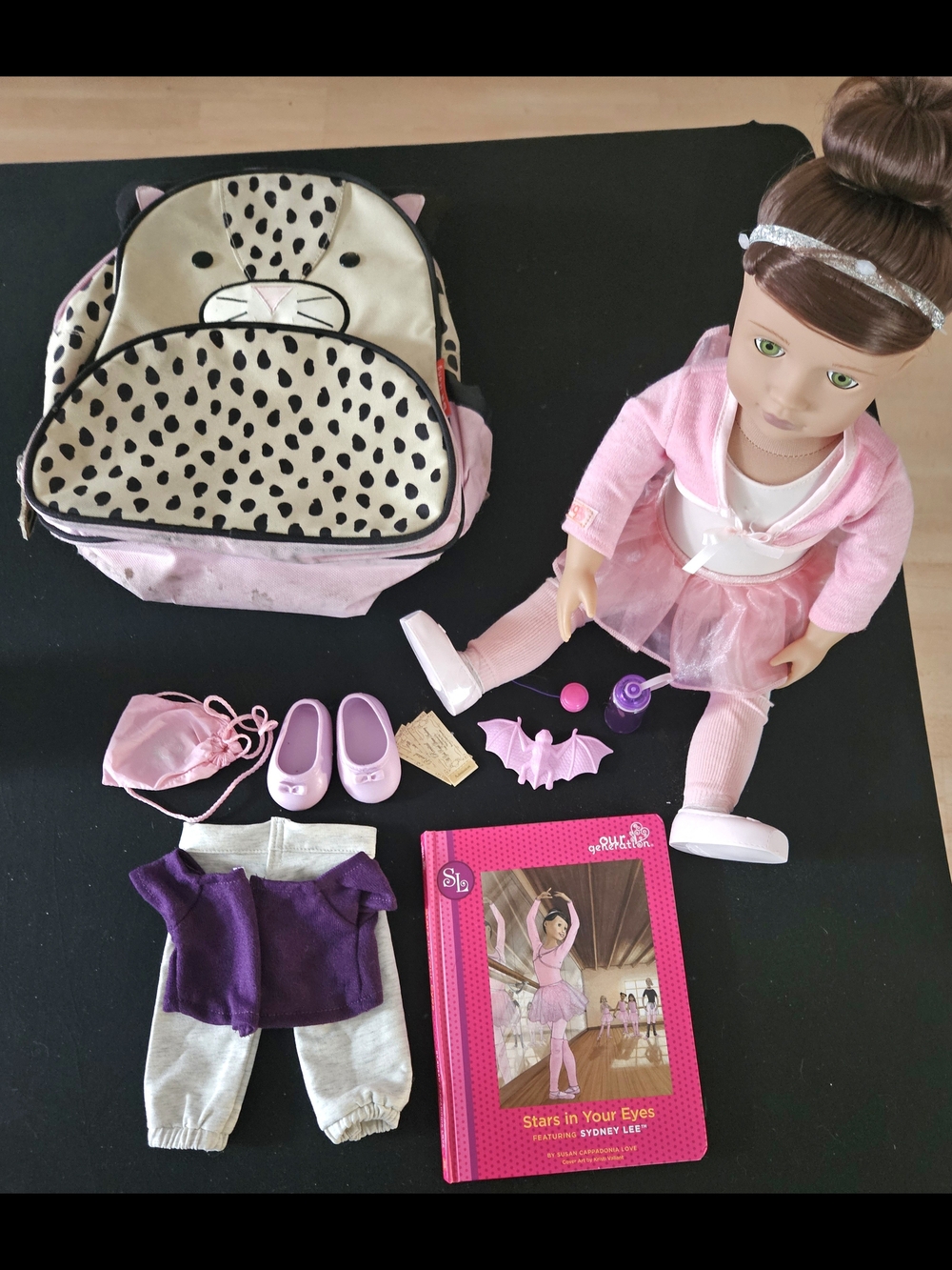 Our Generation Ballet Doll along with her storybook, accessories & backpack